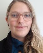 Dr Merryn Brettle